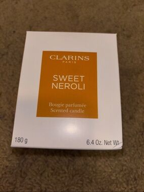 Clarins Sweet Neroli Candle with Orange Label